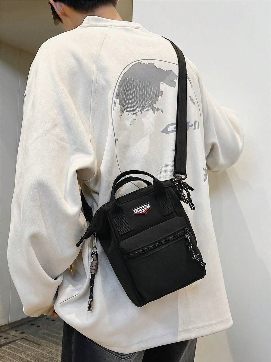 Nuevo bolso bandolera casual de un solo hombro para hombres, estilo vertical pequeño con gran capacidad, ligero y compacto - Negro - Ver 1