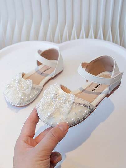 女童凉鞋 2025，新款夏季蝴蝶结，仿珍珠和水钻装饰时尚性能公主鞋，女童宝宝防滑沙滩凉鞋