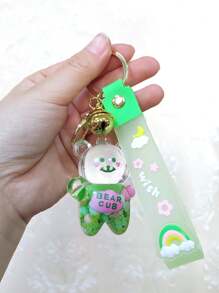 1 pièce Porte-clés créatif en forme d'ours bonbon jelly avec cloche, porte-clés mignon rempli de liquide, convient pour un usage quotidien ou comme cadeau de couple, accessoire de voiture, charm de sac, sac à dos pour l'école