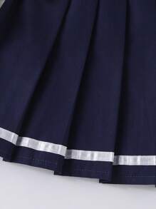 Conjunto de 2 piezas de top sin mangas con cuello polo con bordado de corazón y falda plisada para niñas, para el verano