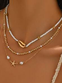 Set de 3 collares largos multienlace con cuentas de vidrio bohemias, conchas metálicas y colgante de estrella de mar, adecuados para usar en vacaciones en la playa por mujeres