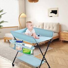 Changing Table, 80*66*98cm Foldable, Portable Changing Table With Storage Basket, Belt And 4 Wheels With Brakes, Height Adjustable.