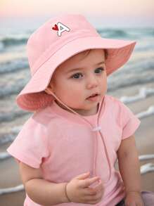 1 pezzo Cappello da sole per bambini con stampa a cuori e lettere, con cordino regolabile antivento, stile casual, cappello secchiello per neonati, adatto per attività all'aperto, spiaggia, protezione dal sole