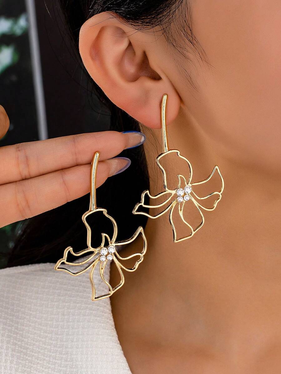 1 paire de boucles d'oreilles design floral minimaliste