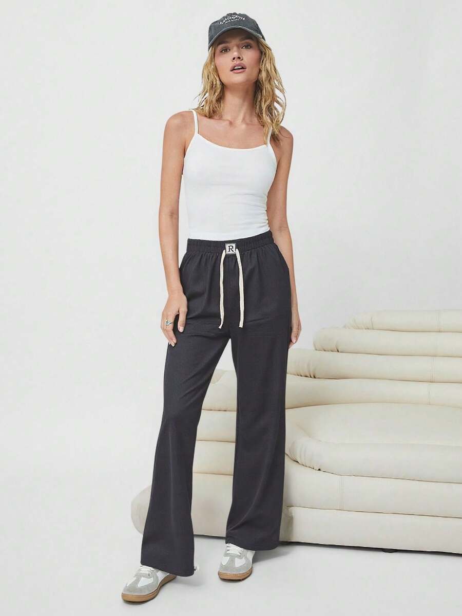 PANTALÓN ENTUBADO - Gris Oscuro - Ver 1