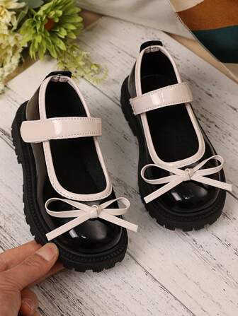 1 paire de chaussures plates décontractées noires grande taille pour petites filles, couleur unie, en PU, avec nœud patchwork, bout rond, antidérapantes, confortables, à la mode, adaptées aux filles de 3 à 12 ans, à porter au quotidien, printemps 2025.