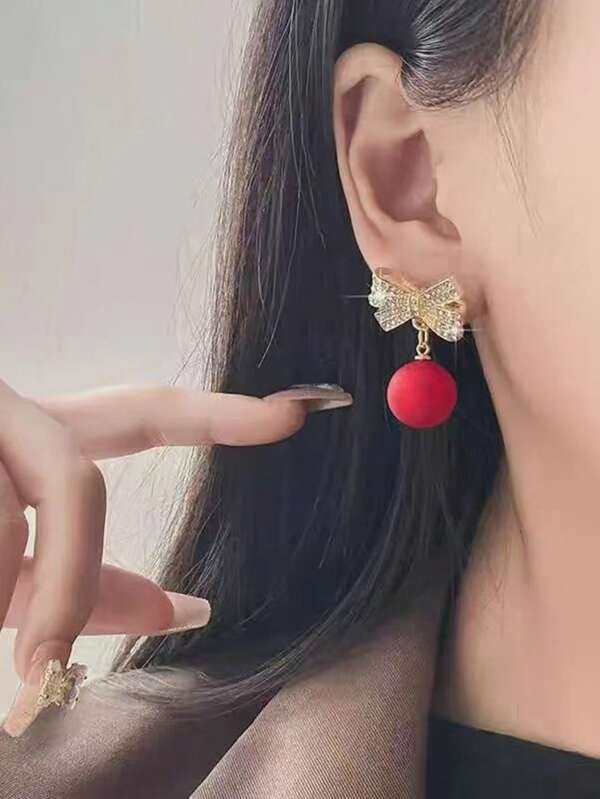 1 par de aretes con moño de metal y bola roja en estilo de moda para mujeres, adecuados para Navidad y fiestas de Año Nuevo