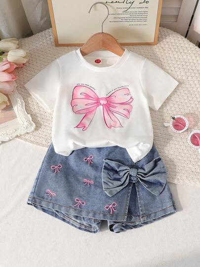 Conjunto de 2 piezas de niña con top de cuello redondo con estampado de lazo + falda/pantalón con bordado de lazo de moda