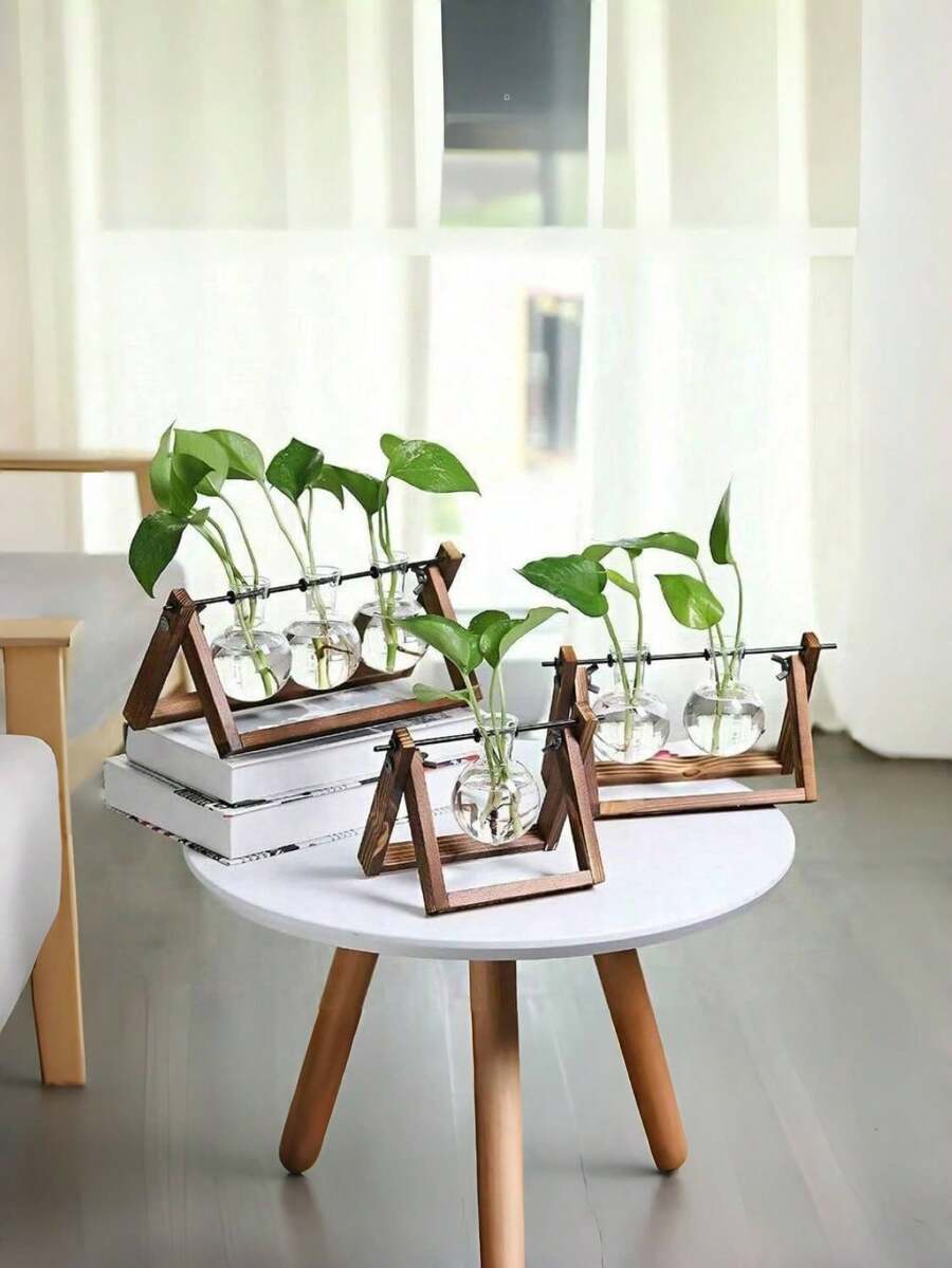 Bộ 3 bình hoa sáng tạo, khung gỗ và chất liệu kính, thích hợp cho cây trồng trong chậu, cây xanh và các loại cây thủy canh khác. Có thể sử dụng cho văn phòng, phòng khách, phòng ngủ, bàn làm việc, bàn ăn và các không gian trang trí nhà cửa khác. Cũng có thể dùng làm bình hoa, vật trang trí hoặc vật trang trí trung tâm. Trang trí bàn làm việc theo phong cách thủy canh cổ điển, thích hợp cho vườn nhà, trang trí văn phòng, trang trí phòng. Cũng có thể dùng làm quà tặng Ngày của Mẹ, quà sinh nhật hoặc quà tốt nghiệp.