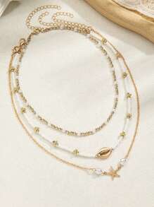 Set de 3 collares largos multienlace con cuentas de vidrio bohemias, conchas metálicas y colgante de estrella de mar, adecuados para usar en vacaciones en la playa por mujeres