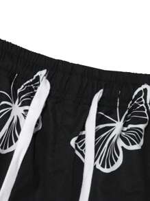Yemwry Men's Casual Pants With Butterfly Pattern Detail, Simple Design For Daily Wear. Unique Butterfly Print Casual Pants, Classic Black & White Colorway, Casual Drawstring Design. Suitable For Strolling The Streets Or Casual Gatherings, To Showcase Your Distinctive Charm.