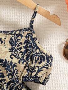 Vestido sin mangas con estampado floral y diseño calado para niña en vacaciones