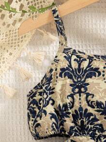 Vestido sin mangas con estampado floral y diseño calado para niña en vacaciones