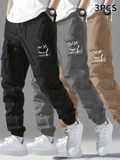 3pcs/Set Tween Boys Casual Drawstring Cargo Pants, Lightweight Elastic Waist Relaxed Fit Cargo Pants For Spring, Summer And Autumn, Smiling Face Printed Paratrooper Pants