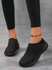 2025 Zapatillas de punto para mujer para exteriores, color negro, transpirables de corte bajo con slip-on, ligeras para caminar y correr
