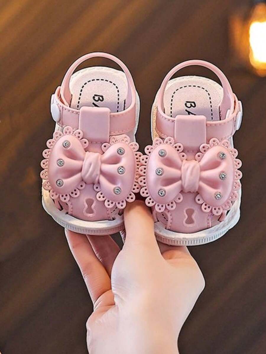 TEEOEC Sandalias de flores de moda para niñas, sandalias con lazo dulce, sandalias deslizantes cómodas y versátiles - Rosa - Ver 1