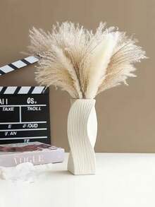 1个不易碎塑料花瓶，是客厅电视柜、书桌等场所的理想装饰品。适用于盆栽植物、鲜花、干花和插花。也是婚礼、派对、办公桌和电脑桌的完美配饰。可搭配人造花和花瓶，满足各种装饰需求（仅含花瓶）。适合作为生日礼物、毕业礼物、家居装饰、房间装饰等。玻璃花瓶 - 白色 - 查看 4