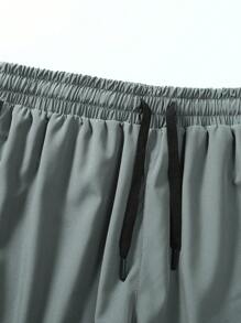 Short de sport unicolore pour le printemps et l'été, anti-frottement, short de sport à double couche pour hommes et femmes, course, gym extérieure, pantalon casual