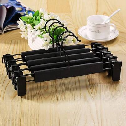 Perchas para pantalones, ropa negra, perchas de plástico para pantalones con 2 clips ajustables antioxidantes, perchas de falda y 360 ganchos giratorios para pantalones, paquete de 10