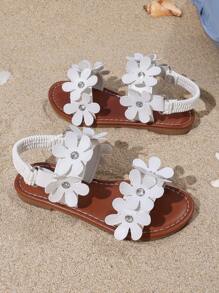 Sandalias de moda para el verano 2025, sandalias planas versátiles con estampado floral ditsy para niños, sandalias de dedo abierto deslizantes, casuales/para interiores, antideslizantes y duraderas