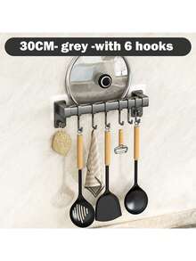 1 件多功能厨房架，集成存储，释放台面空间。锅铲勺架。