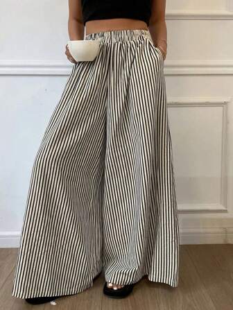Pantalones holgados de cintura elástica casual con estampado de rayas y pierna ancha, estilo versátil