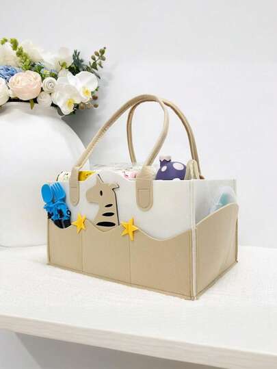 1个大容量毛毡尿布包，适合户外旅行，可用于存放尿布，也适合存放玩具、尿布、奶瓶、湿巾、纸巾、奶粉盒、围兜、餐具和其他物品。