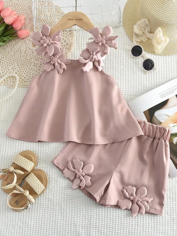 Conjunto de 2 piezas para niñas jóvenes con flores tridimensionales en los tirantes y pantalones cortos, ideal para el verano