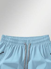 Pantalones deportivos cortos 3/4 con bolsillo con cremallera antiextracción y cordón en la cintura para hombre
