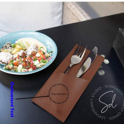 1PC Custom High-End Leather Cutlery Bag, 22x9cm, Available In Brown And Black. Specifically Designed With Compartments For Knives, Forks, And Other Utensils. It Offers A Comfortable Feel, Is Durable, Lightweight, Easy To Carry, And Stylish.