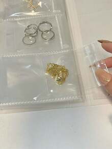 1 pieza Bolsa de almacenamiento de joyas portátil y transparente, Caja de almacenamiento y exhibición de joyas de gran capacidad con malla de 84/160, Libro de almacenamiento de joyas con estilo de cuaderno, Estuche exclusivo para cada joya, Esencial para viajes - Multicolor - Ver 5