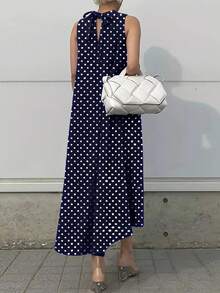 女式新款休闲中长款波尔卡圆点圆领不对称A字连衣裙