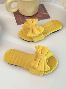 A Pair Of Summer Hot Kids' Non-Slip Slippers. The Upper Is Made Of Yellow Towel Material, With Checked Texture, And The Front Is Decorated With A Large Bow, Which Is Sweet And Lovely. Suitable For 3-12 Year Old Girls To Wear At Home, Comfortable And Can Add Children's Fun; Can Also Be Worn In Warmer Weather, Is Both Practical And Beautiful Fashion Items. - Yellow - View 3