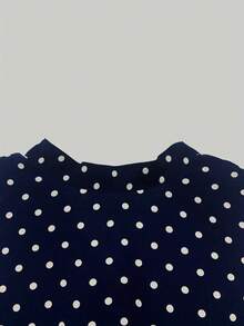 女式新款休闲中长款波尔卡圆点圆领不对称A字连衣裙