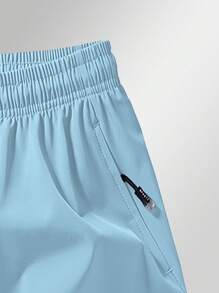 Pantalones deportivos cortos 3/4 con bolsillo con cremallera antiextracción y cordón en la cintura para hombre