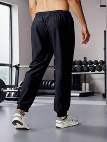 男士运动冰丝裤，直筒抽绳休闲裤，轻薄透气，适合夏季和秋季穿着 - 藏蓝色 - 查看 2