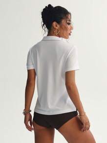 Polo de moda para mujer con diseño de malla texturizada transpirable y elástica, de estilo minimalista casual para uso diario