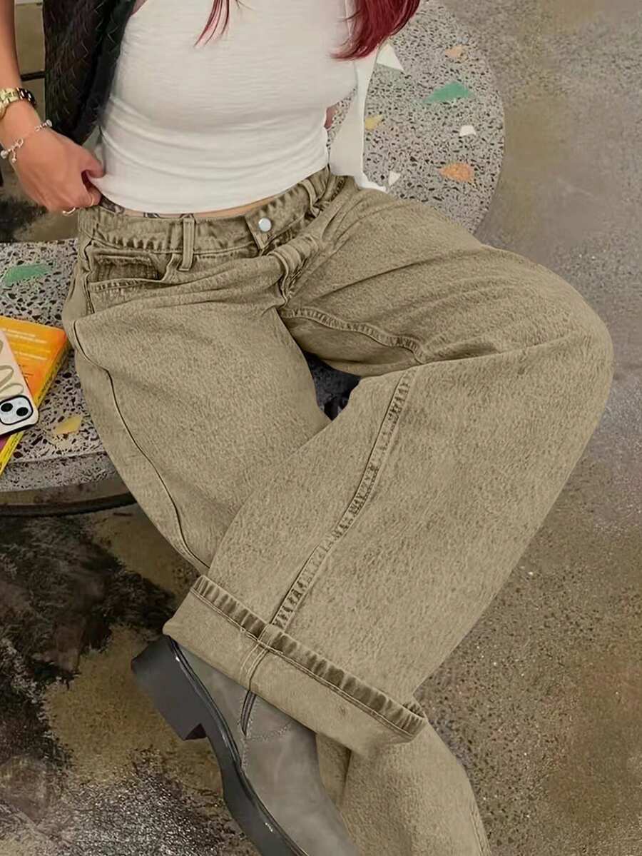 Jeans feminino casual versátil com bolsos inclinados e perna reta solta, primavera e outono