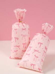 25/50/100 件粉色蝴蝶结图案糖果袋、糖果礼品袋、派对礼品袋、零食袋、巧克力饼干烘焙袋、糖果包装袋、糖果包装袋、1 岁生日派对用品、粉色生日装饰品、新娘送礼会用品、蝴蝶结生日装饰品、婴儿送礼会装饰、粉色蝴蝶结生日装饰、性别揭示派对用品、粉色蝴蝶结装饰、婚礼装饰、节日派对用品