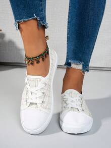 女士时尚滑板鞋，白色豹纹拼色系带低帮厚底运动鞋，休闲百搭户外运动鞋