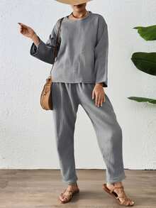 Conjunto de pijama afelpada para mujer. Clásica, con hermosos colores, camisa de manga larga y cuello redondo, pantalón de ajuste natural con resorte. Tela muy suave, ligera y agradable con tu piel, ideal para verano, primavera, otoño e invierno. - Gris - Ver 5