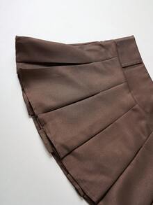 Falda plisada de diseño en forma de V, falda corta marrón, tela de traje, falda de corte A con cierre de cremallera plisada, falda ajustada con cintura en V estilo preppy, adecuada para primavera y verano. - Marrón - Ver 6