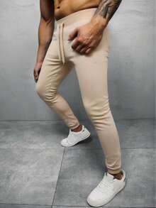 Pantaloni casual da uomo con vita regolabile e coulisse, in tinta unita