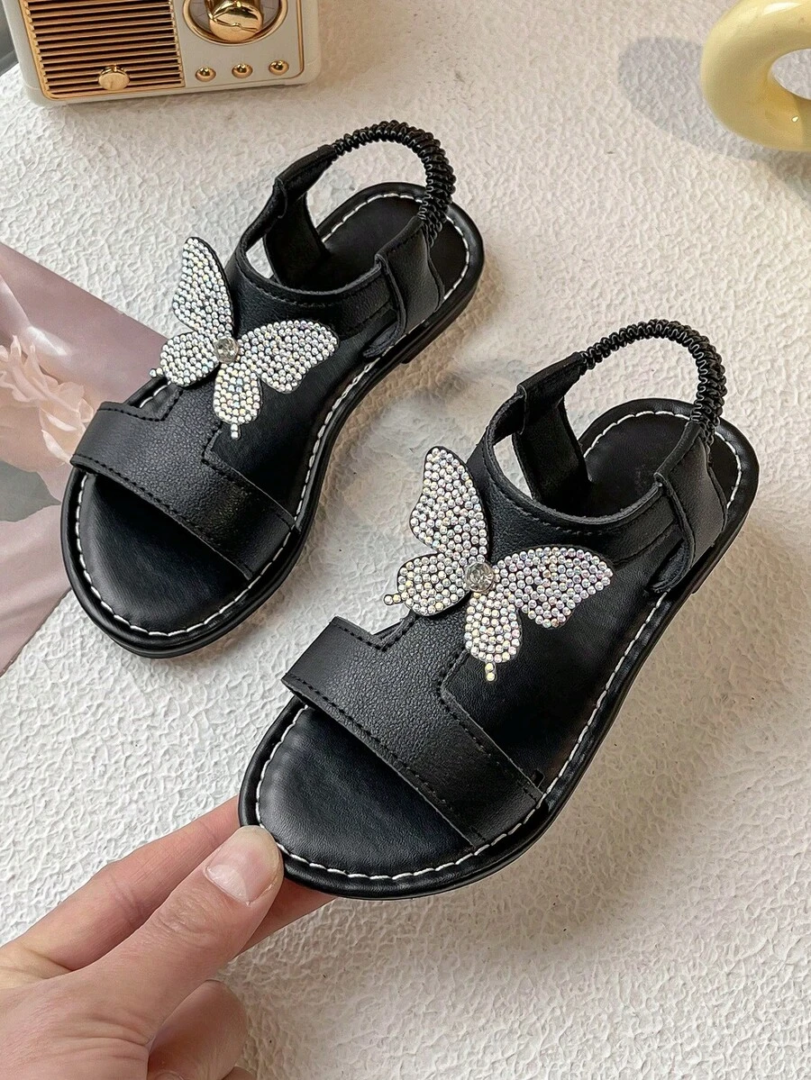 Sandalias de verano para niñas pequeñas, color blanco, con decoración de mariposa y cristales, de punta abierta, cómodas y transpirables, zapatos de moda para niños para uso diario y fiesta - Negro - Ver 1