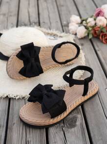 Sandali flat con fiocco decorativo e punta aperta per donna, moda estiva casual da festa e ufficio, in raso nero