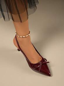 Sandalias de tacón stiletto alto con punta puntiaguda y lazo elegante para mujeres. Zapatos de vestir sexy y de moda, apropiados para uso diario, discoteca, boda, exteriores y verano. Disponibles en colores rojo, negro y blanco.