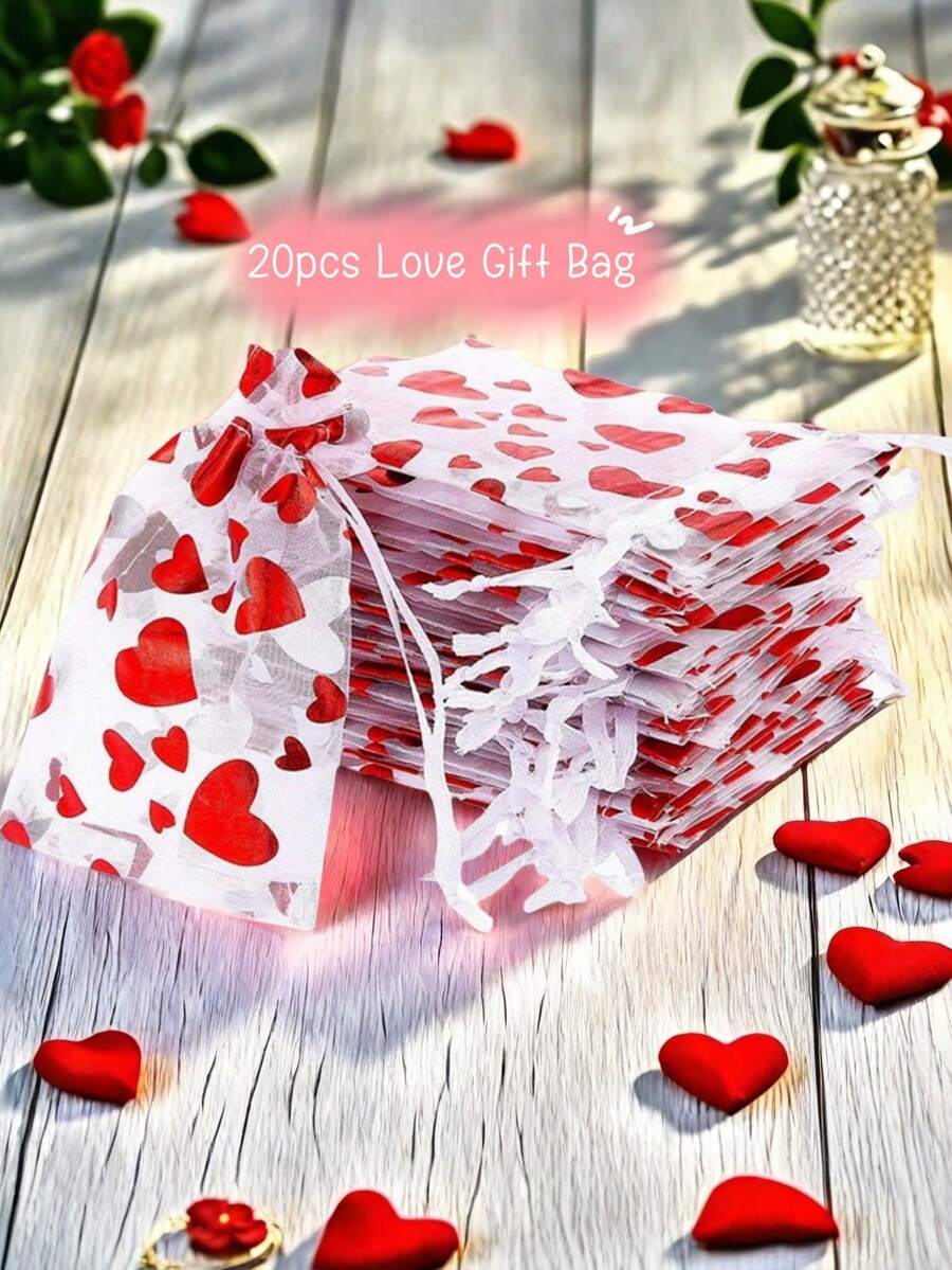 20 件透明心形欧根纱礼品袋。密集欧根纱材质，经久耐用。抽绳闭合设计，快速轻松闭合。 - 白色 - 查看 1