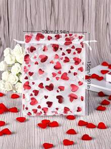 20 件透明心形欧根纱礼品袋。密集欧根纱材质，经久耐用。抽绳闭合设计，快速轻松闭合。 - 白色 - 查看 2