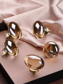 6 قطع مقابض خزانة بشكل بيضاوي شفاف من الاكريليك، مناسبة للخزائن والدواليب والأدراج، من خامة النحاس بطلاء لون الشمبانيا، بأسلوب فاخر، تأتي مع البراغي