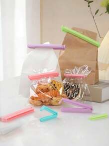 12 piezas - Selladoras de bolsas de alimentos, clips de sellado de bolsas de aperitivos, clips de sellado portátiles de colores aleatorios, abrazadera de sellado de acero inoxidable, clip de sellado de bolsas de aperitivos, adecuado para pinzas de ropa y sellado de bolsas de alimentos y almacenamiento, nueva herramienta de sellado de plástico para accesorios de cocina